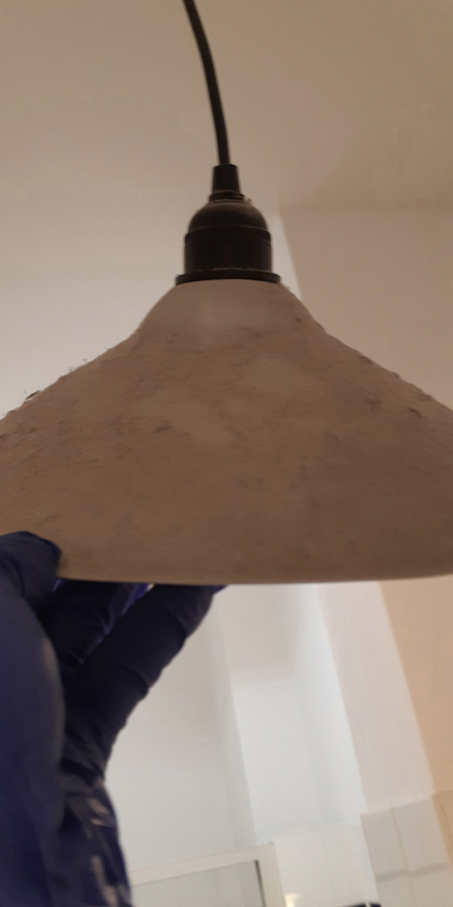 Lamp covered with dust