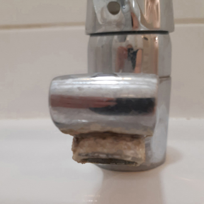 Limescale calcified water tap