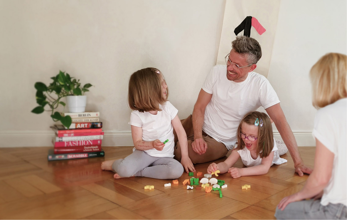 Mother, father and 2 daughters having a good time