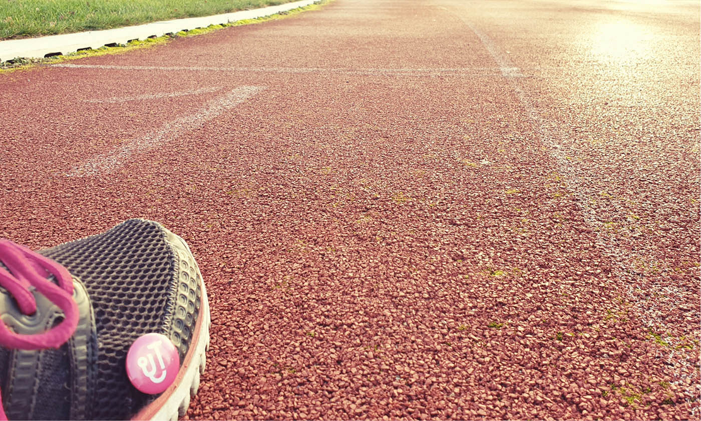 Shoe with putzen4you logo on the race track